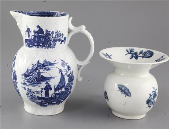 A Caughley blue and white floral spittoon, c.1780 and a Caughley fisherman and cormorant pattern mask jug, height 12cm and 18cm